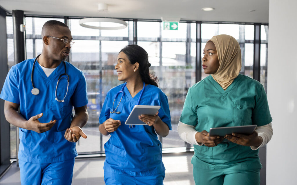 Medical Workers Walking through the Corridor